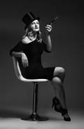 Charming fashion model with beautiful curly hair. Momochrome sho