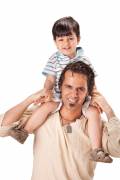 Father and little son studio portrait