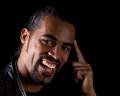 Portrait of cool latino man  on black